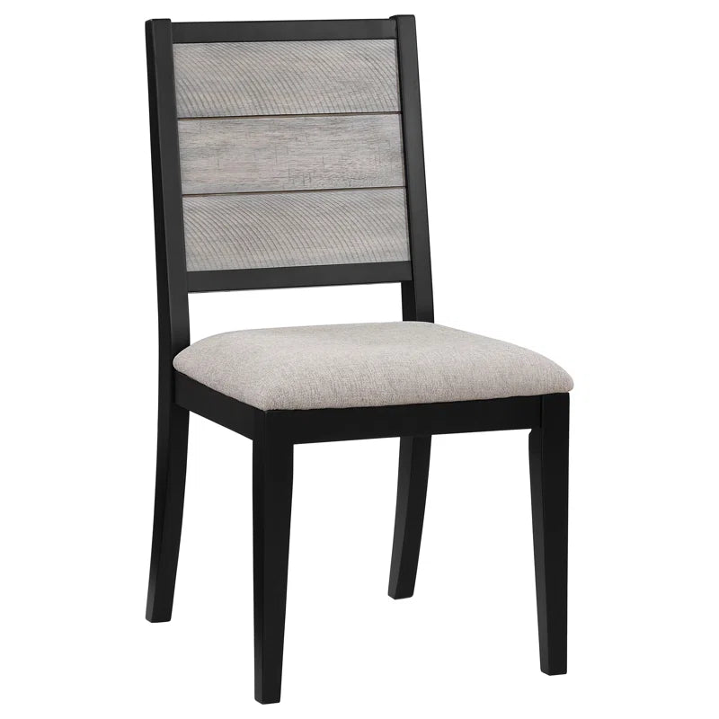 Dining chair with black frame and gray cushioned backrest on a white background