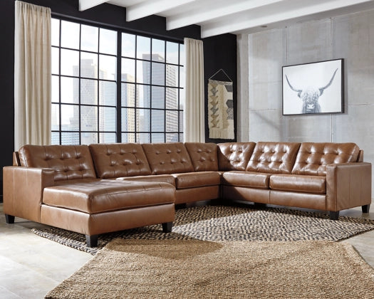 Baskove 4-Piece Sectional with Chaise - Furnish 4 Less